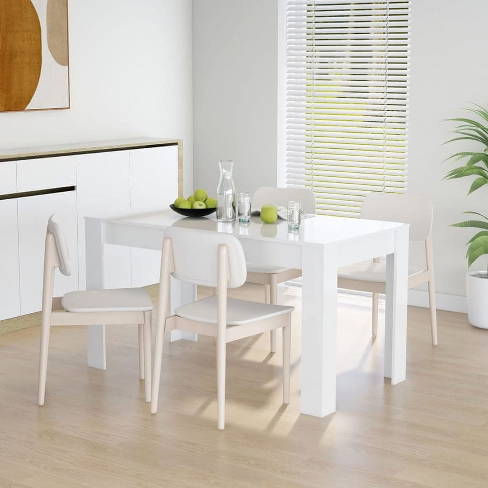 Vidaxl Jedálenský stôl lesklý biely 140x74,5x76 cm drevotrieska